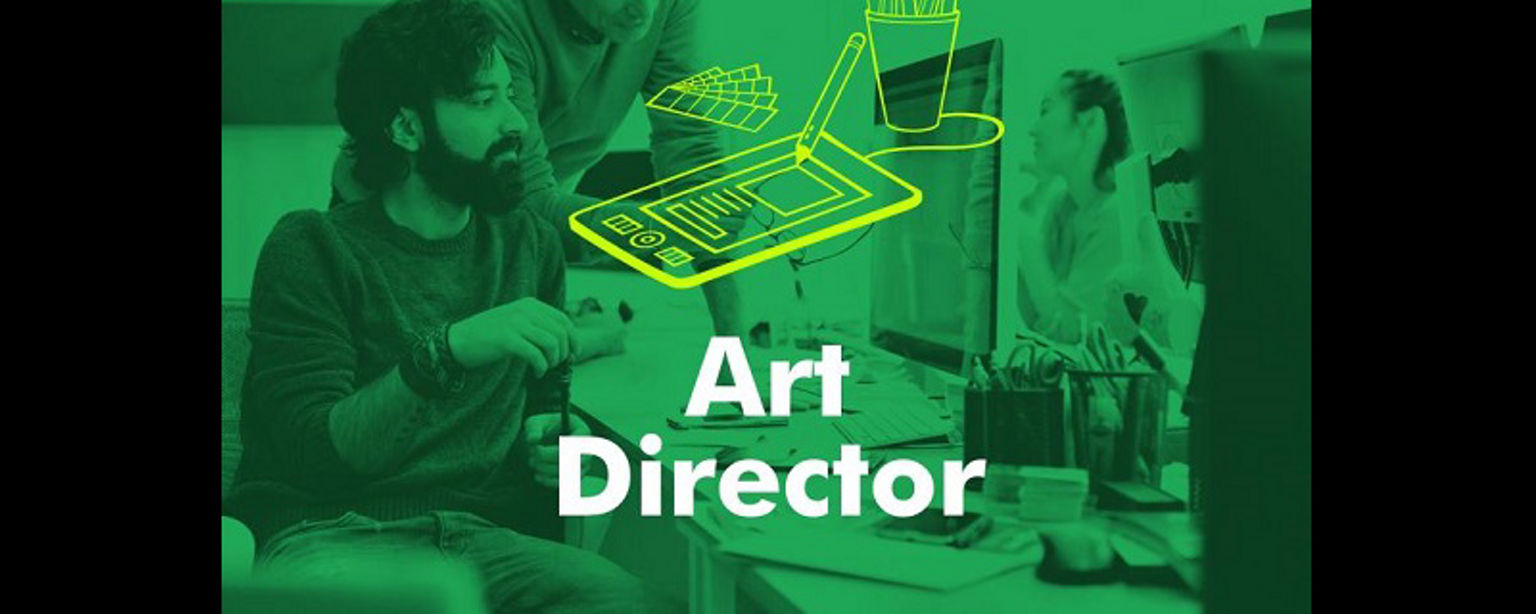 An art director works in an office environment as a coworker looks on; the words "Art Director" are overlaid on the image.